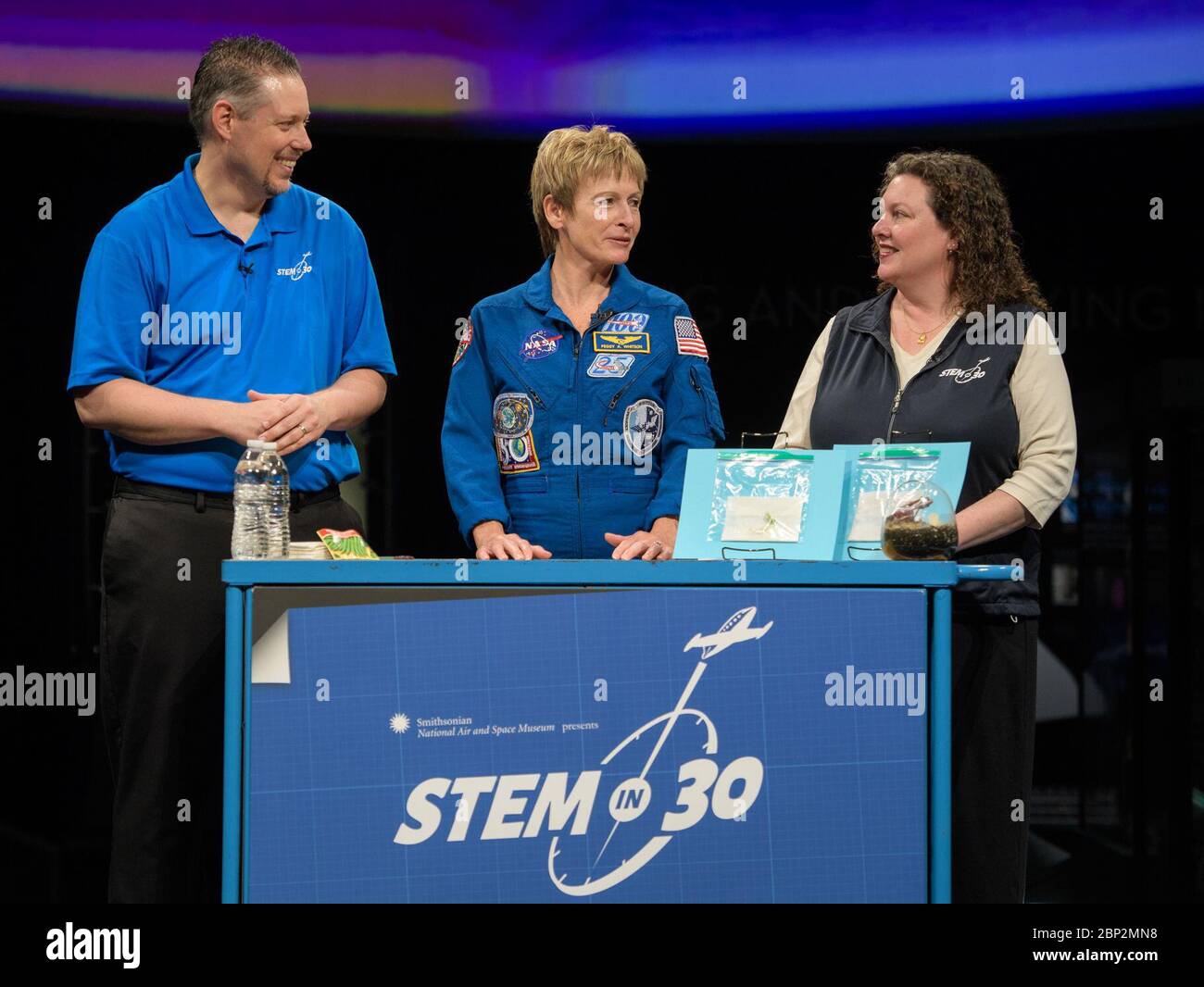 Astronaut Peggy Whitson at NASM  NASA astronaut Peggy Whitson tapes a segment for STEM in 30 with Marty Kelsey, left, and Beth Wilson, Friday, March 2, 2018 at the Smithsonian's National Air and Space Museum in Washington. Whitson spent 288 days onboard the International Space Station as a member of Expedition 50, 51, and 52, conducting four spacewalks and contributing to hundreds of experiments in biology, biotechnology, physical science and Earth science during her stay. Stock Photo