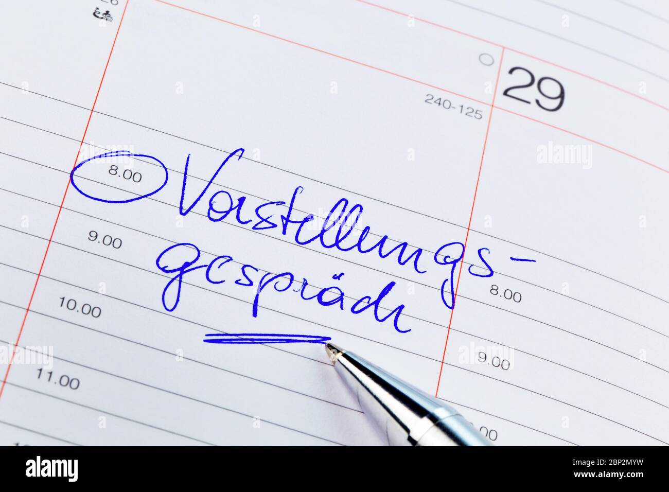 Ein Termin ist in einem Kalender eingetragen: Vorstellungsgespraech Stock Photo