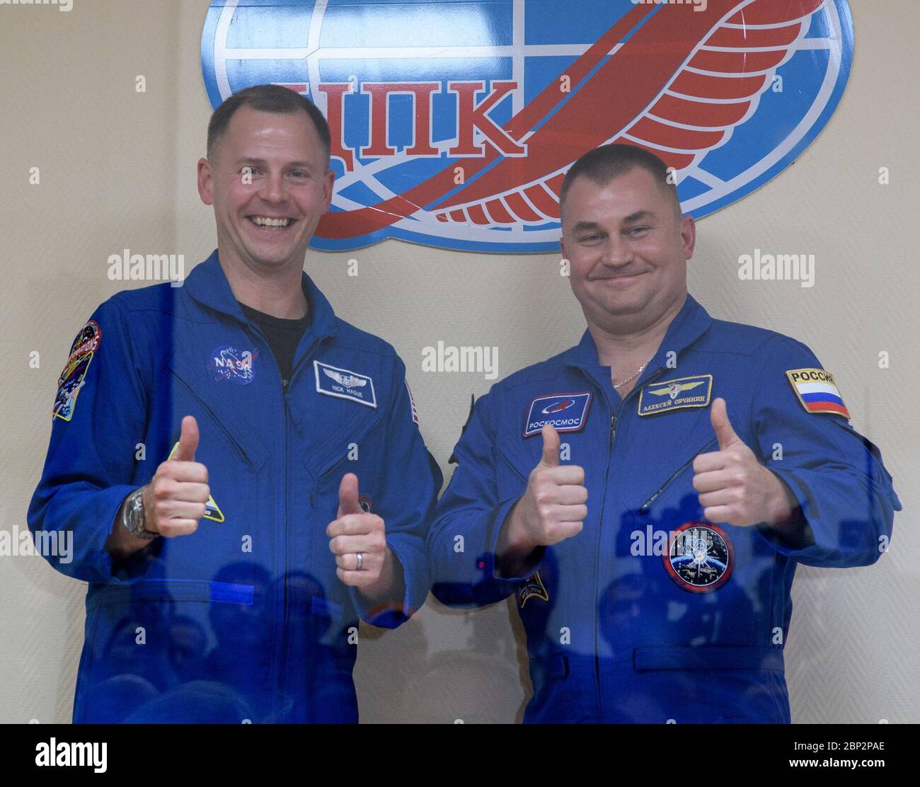 Expedition 57 Press Conference  Expedition 57 Flight Engineer Nick Hague of NASA, left, and Flight Engineer Alexey Ovchinin of Roscosmos pose for a photo following a crew press conference, Wednesday, Oct. 10, 2018 at the Cosmonaut Hotel in  Baikonur, Kazakhstan. Hague and Ovchinin are scheduled to launch on October 11 and will spend the next six months living and working aboard the International Space Station. Stock Photo