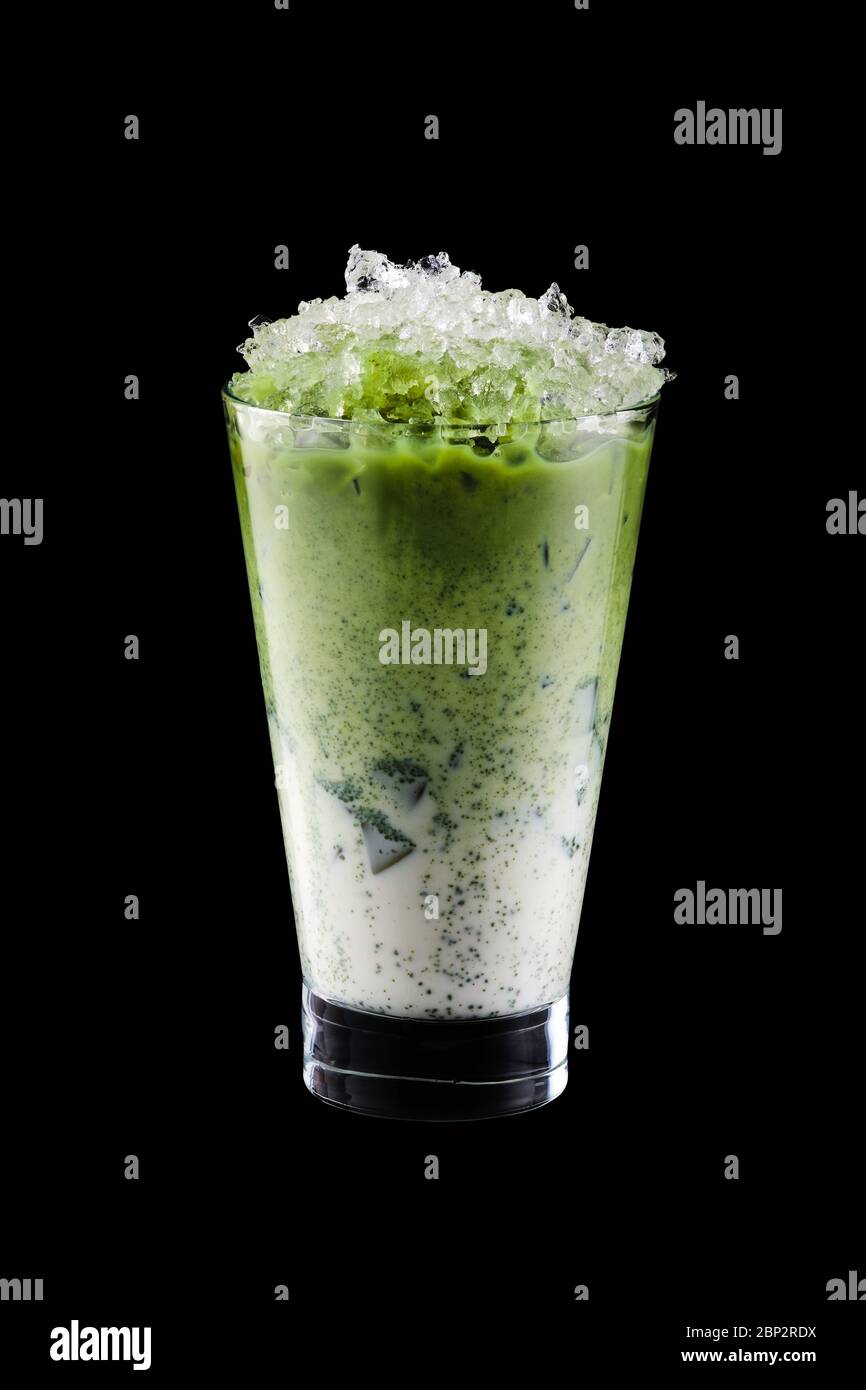 Iced matcha tea and crushed ice isolated on black background Stock Photo