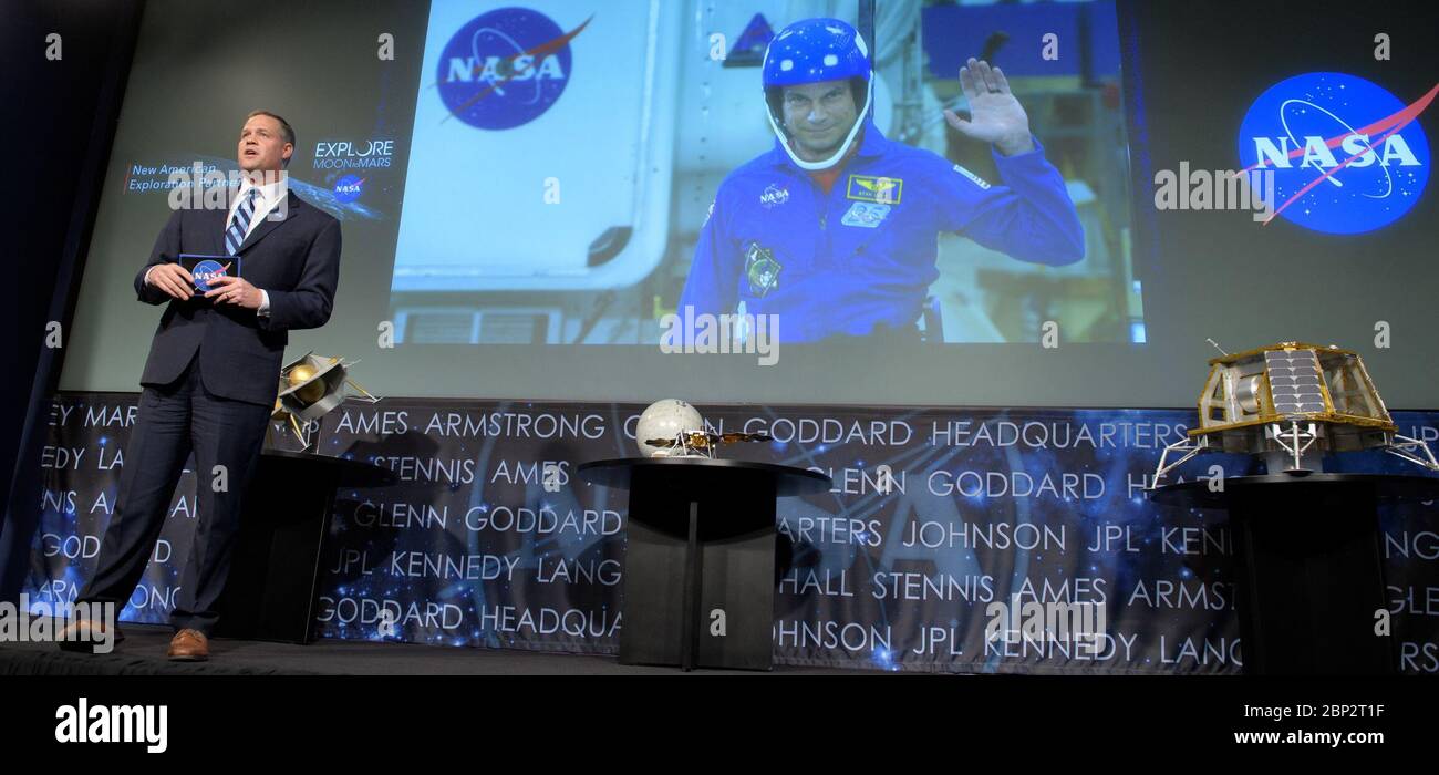 Commercial Lunar Payload Services (CLPS)  NASA Administrator Jim Bridenstine talks via satellite with NASA astronaut Stan Love from NASA’s Johnson Space Center in Houston during an event where it was announced that nine U.S. companies are eligible to bid on NASA delivery services to the lunar surface through Commercial Lunar Payload Services (CLPS) contracts, Thursday, Nov. 29, 2018 at NASA Headquarters in Washington. The companies will be able to bid on delivering science and technology payloads for NASA, including payload integration and operations, launching from Earth and landing on the su Stock Photo