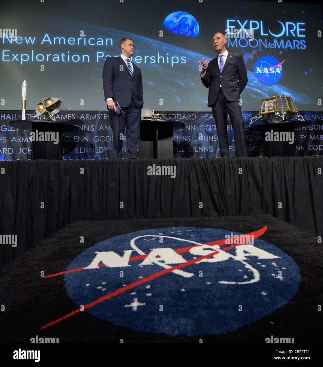 Commercial Lunar Payload Services (CLPS)  NASA Administrator Jim Bridenstine, left, and NASA Associate Administrator for the Science Mission Directorate, Thomas Zurbuchen, answer questions during an event where nine U.S. companies where named as eligible to bid on NASA delivery services to the lunar surface through Commercial Lunar Payload Services (CLPS) contracts, Thursday, Nov. 29, 2018 at NASA Headquarters in Washington. The companies will be able to bid on delivering science and technology payloads for NASA, including payload integration and operations, launching from Earth and landing on Stock Photo