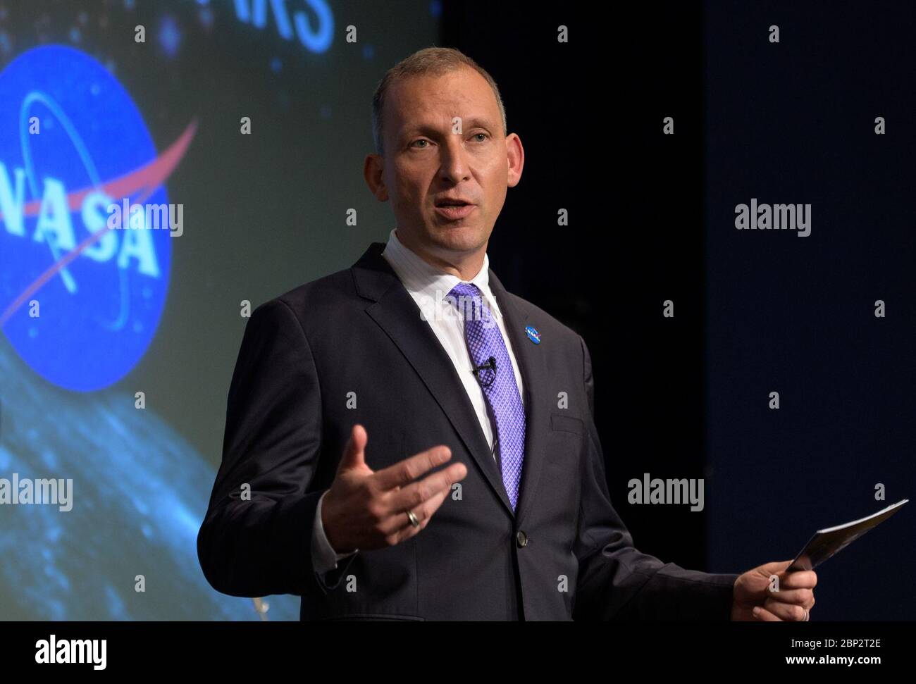 Commercial Lunar Payload Services (CLPS)  NASA Associate Administrator for the Science Mission Directorate, Thomas Zurbuchen, answers questions during an event where nine U.S. companies where named as eligible to bid on NASA delivery services to the lunar surface through Commercial Lunar Payload Services (CLPS) contracts, Thursday, Nov. 29, 2018 at NASA Headquarters in Washington. The companies will be able to bid on delivering science and technology payloads for NASA, including payload integration and operations, launching from Earth and landing on the surface of the Moon. NASA expects to be Stock Photo