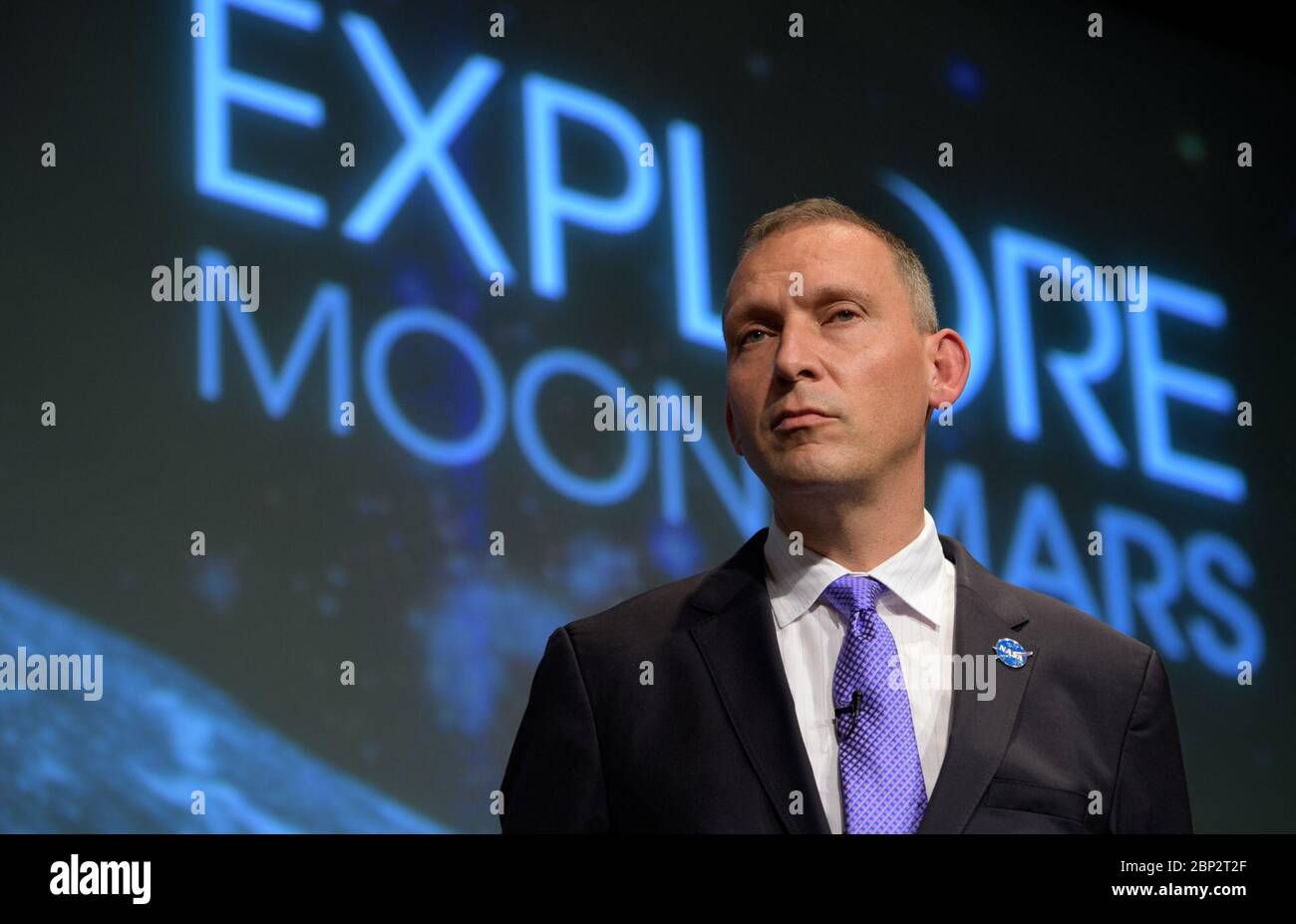 Commercial Lunar Payload Services (CLPS)  NASA Associate Administrator for the Science Mission Directorate, Thomas Zurbuchen, answers questions during an event where nine U.S. companies where named as eligible to bid on NASA delivery services to the lunar surface through Commercial Lunar Payload Services (CLPS) contracts, Thursday, Nov. 29, 2018 at NASA Headquarters in Washington. The companies will be able to bid on delivering science and technology payloads for NASA, including payload integration and operations, launching from Earth and landing on the surface of the Moon. NASA expects to be Stock Photo