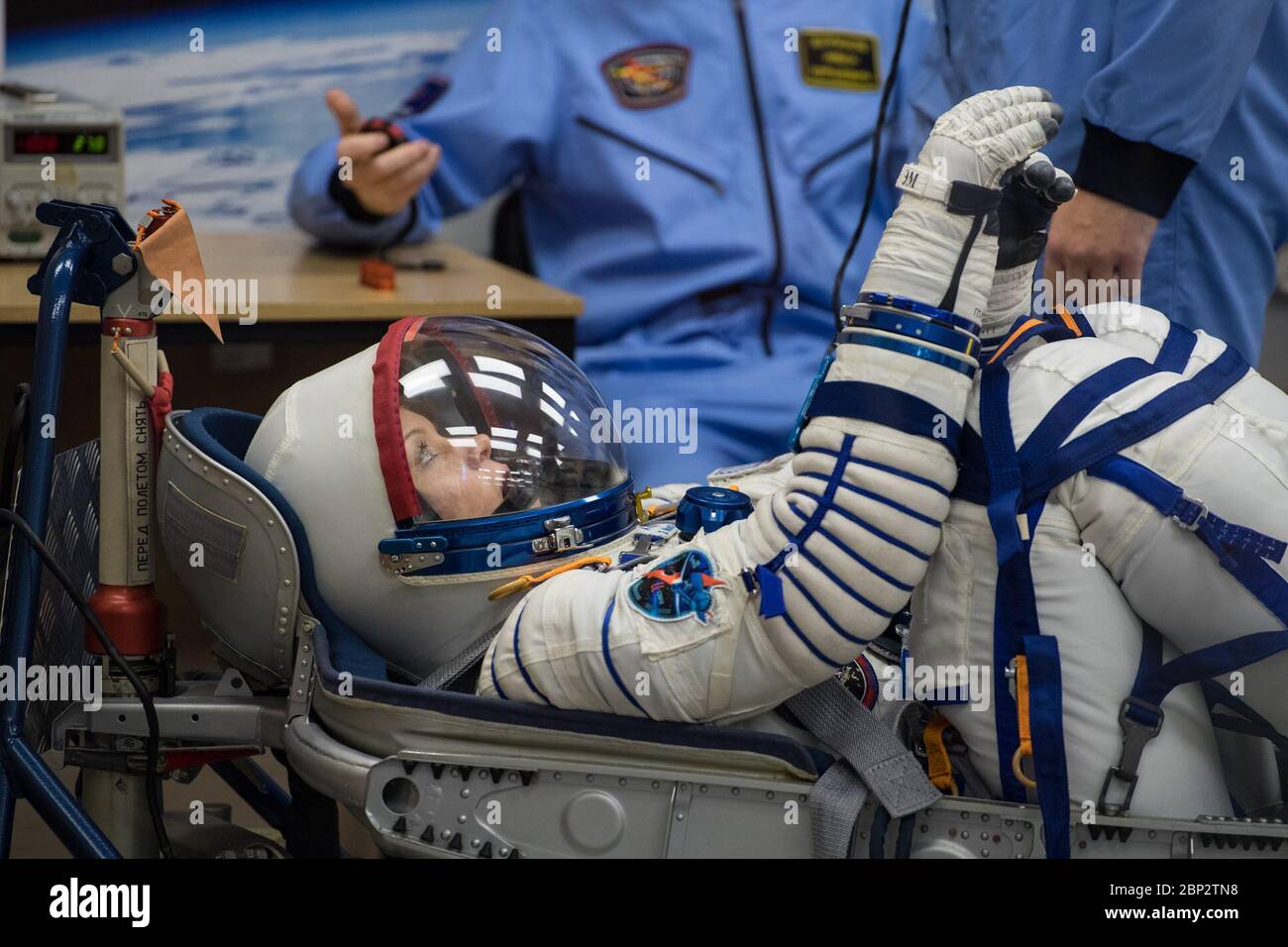 Expedition 58 Pressure Checks  Expedition 58 Flight Engineer Anne McClain of NASA has her Russian Sokol suit pressure checked in preparation for her launch aboard the Soyuz MS-11 spacecraft on Monday, Dec. 3, 2018, at the Baikonur Cosmodrome in Kazakhstan. Launch of the Soyuz rocket is scheduled for the same day and will carry McClain, Soyuz Commander Oleg Kononenko of Roscosmos, and Flight Engineer David Saint-Jacques of the Canadian Space Agency (CSA) into orbit to begin their six and a half month mission on the International Space Station. Stock Photo