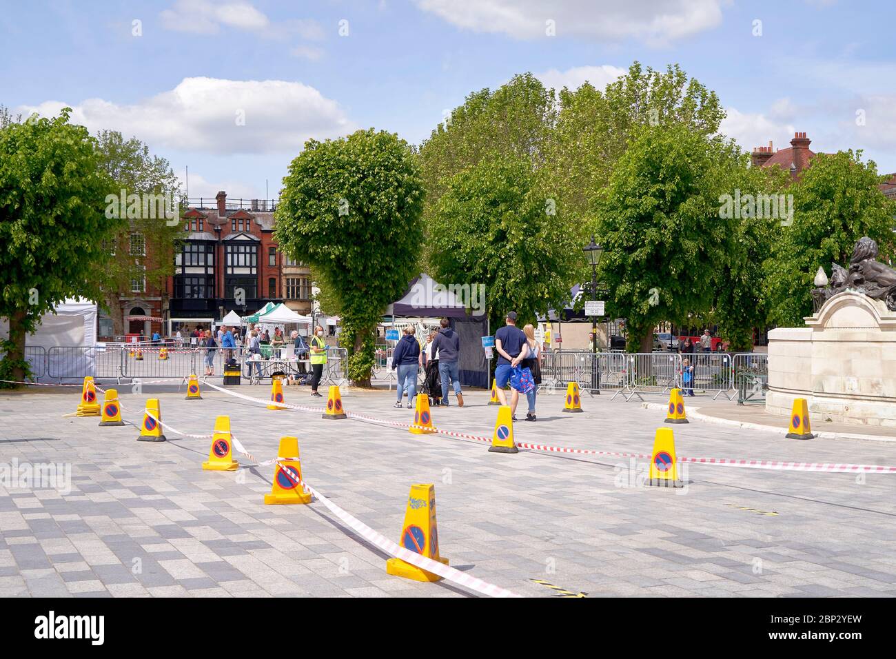 Queuing lanes marked out by bollards and tape Stock Photo