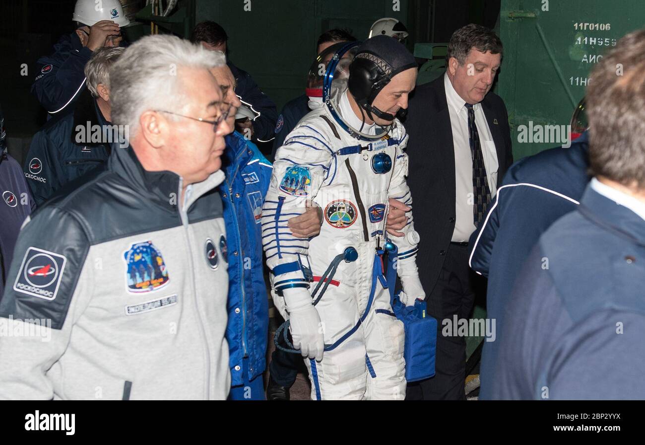 Expedition 55 Preflight  NASA International Space Station Program Manager Kirk Shireman escorts Expedition 55 flight engineer Ricky Arnold of NASA as he prepares to board the Soyuz MS-08 spacecraft for launch, Wednesday, March 21, 2018 at the Baikonur Cosmodrome in Kazakhstan. Arnold and his crewmates Drew Feustel of NASA and Oleg Artemyev of Roscosmos will spend the next five months living and working aboard the International Space Station. Stock Photo