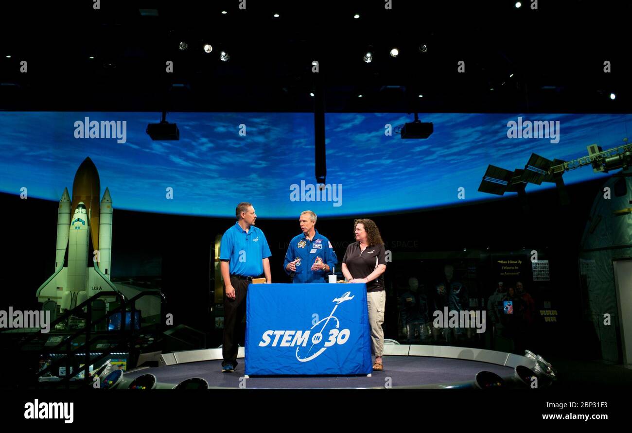 Astronaut Drew Feustel at NASM  NASA astronaut Drew Feustel, center, tapes a segment of STEM in 30 with Marty Kelsey, left, and Beth Wilson, right, Thursday, May 9, 2019 at the Smithsonian’s National Air and Space Museum in Washington, DC. Feustel most recently spent 197 days living and working onboard the International Space Station as part of Expedition 55 and as commander of Expedition 56. Feustel ventured outside the space station on three spacewalks, moving him up to second among U.S. spacewalkers with a cumulative time of 61 hours 48 minutes over nine spacewalks. Stock Photo