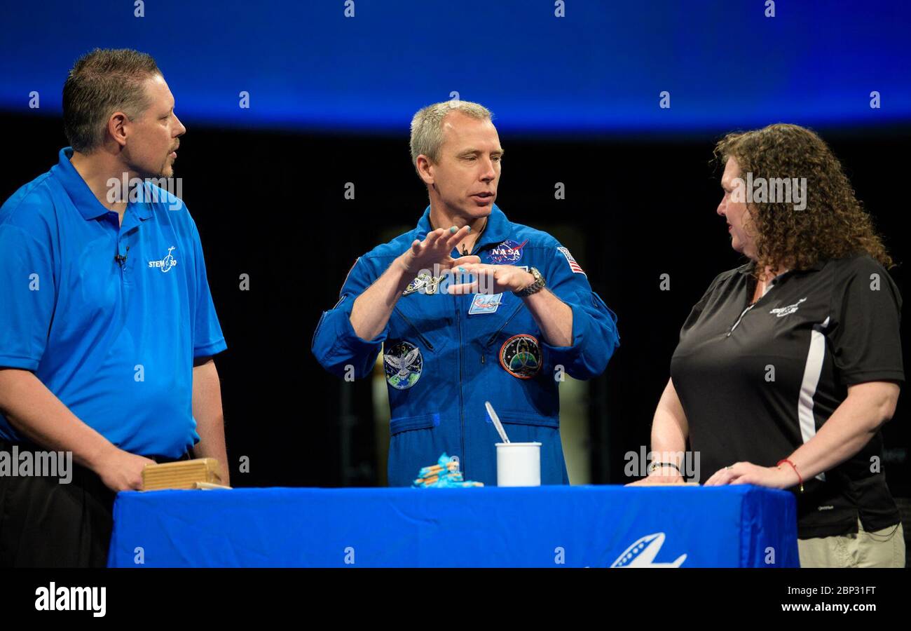Astronaut Drew Feustel at NASM  NASA astronaut Drew Feustel, center, talks about seismology while taping a segment of STEM in 30 with Marty Kelsey, left, and Beth Wilson, right, Thursday, May 9, 2019 at the Smithsonian’s National Air and Space Museum in Washington, DC. Feustel most recently spent 197 days living and working onboard the International Space Station as part of Expedition 55 and as commander of Expedition 56. Feustel ventured outside the space station on three spacewalks, moving him up to second among U.S. spacewalkers with a cumulative time of 61 hours 48 minutes over nine spacew Stock Photo