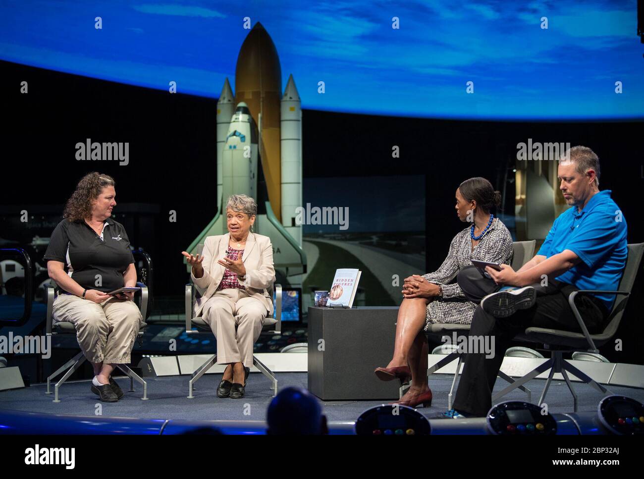 'Hidden Figures' Panel Discussion  NASA human computer Christine Darden, second from left, speaks during a &quot;Hidden Figures&quot; panel discussion with &quot;Hidden Figures&quot; author, Margot Lee Shetterly, second from right, and Beth Wilson, left, and Marty Kelsey, right, of STEM in 30, Wednesday, June 12, 2019 at the Smithsonian National Air and Space Museum in Washington. The panel discussion took place after a ceremony dedicating the 300 block of E Street SW as &quot;Hidden Figures Way&quot; to honor Katherine Johnson, Dorothy Vaughan, Mary Jackson and all of the women who have dedic Stock Photo