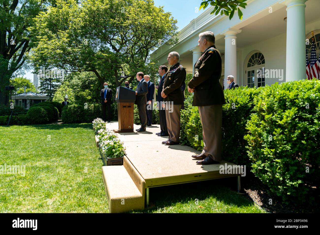 U.S. President Donald Trump, listens as Health and Human Secretary Alex Azar, discusses COVID-19 vaccine development in the Rose Garden of the White House May 15, 2020 in Washington, D.C. Stock Photo