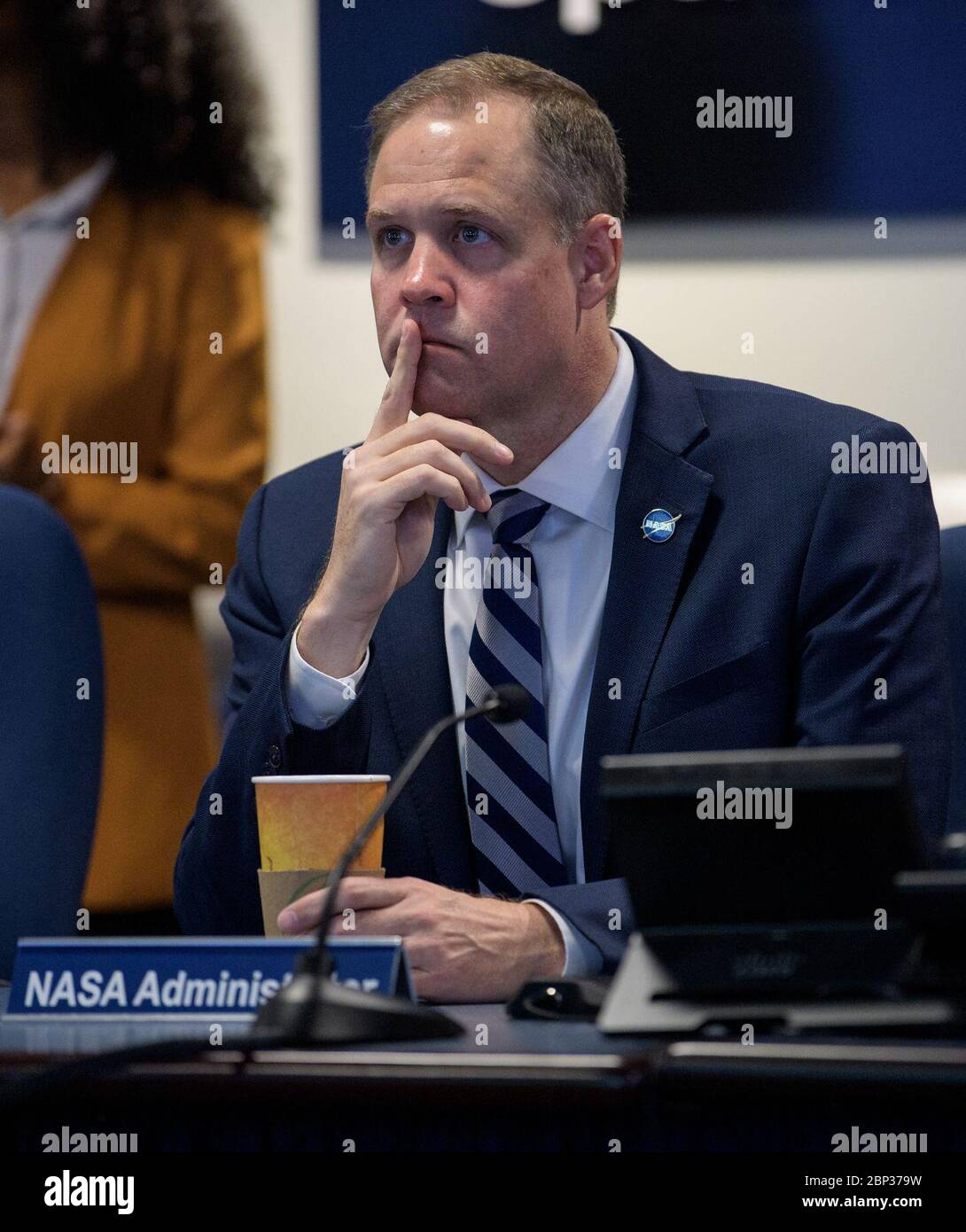 NASA Leadership and Members of Congress watch First All-Woman Spacewalk  NASA Administrator Jim Bridenstine is seen as he watches the beginning of the first all-woman spacewalk on Friday, Oct. 18, 2019, from the Space Operations Center at NASA Headquarters in Washington. The first all-woman spacewalk in history began at 7:38am EDT with NASA astronauts Christina Koch and Jessica Meir venturing outside the International Space Station to replace a failed battery charge-discharge unit. This is the fourth spacewalk for Koch and Meir’s first. Stock Photo