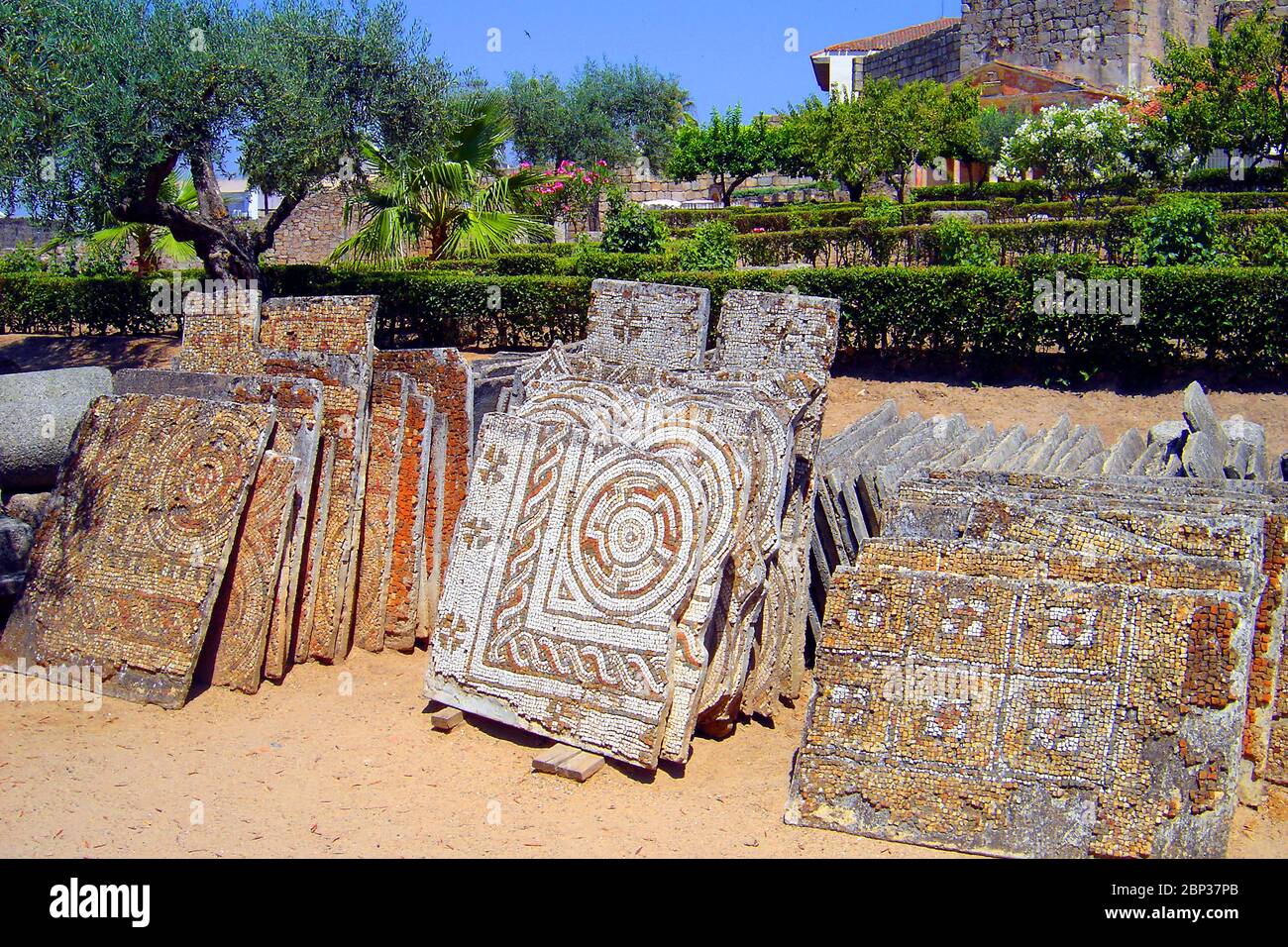 Recently uncovered Roman tesserae  mosaics, Merida, Spain, photographed in June 2006. The town was founded by veterans of the Roman Army in 25 BC, with the name of Emerita Augusta (meaning the veterans or discharged soldiers of the army of Augustus. Many Roman remains can be seen there including the longest of all existing Roman bridges Puente Romano still used by pedestrians, The Temple of Diana and  Aqueduct remains . The town hosts the Museo Nacional de Arte Romano (National Museum of Roman Art) which holds Roman artifacts and artwork from around Spain. Stock Photo