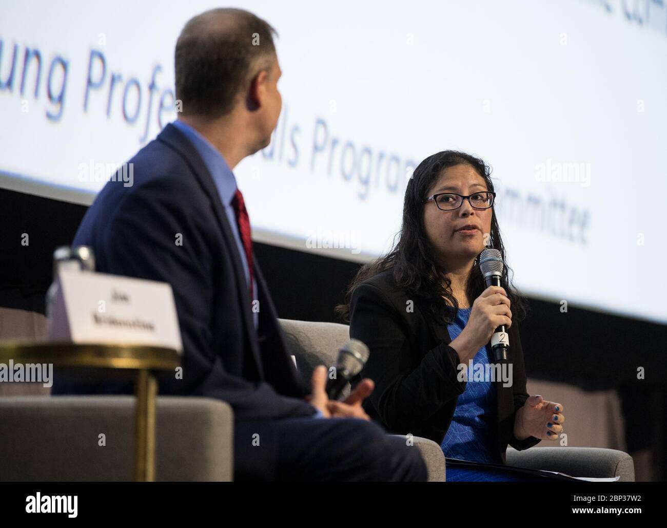 70th International Astronautical Congress  Jackelynne Silva-Martinez, an Aerospace Engineer in Mission Planning Operations at NASA’s Johnson Space Center, right, asks NASA Administrator Jim Bridenstine a question during the Global Networking Forum Young Professionals Town Hall at the 70th International Astronautical Congress, Wednesday, Oct. 23, 2019 at the Walter E. Washington Convention Center in Washington. Stock Photo