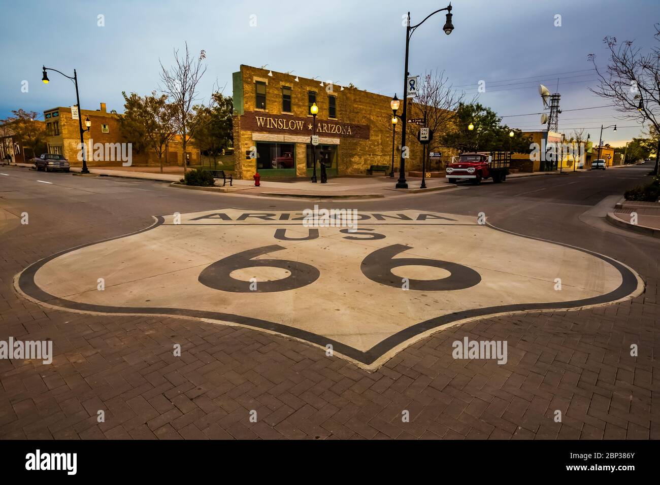 Standin' on the Corner Park and the intersection of Old Highway 66 and North Kinsley Avenue in Winslow, Arizona, a location made famous by The Eagles Stock Photo