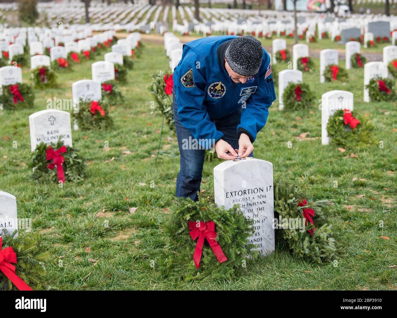 NASA astronaut Doug Wheelock participated in National Wreaths Across America Day on December 14, 2019, at Arlington National Cemetery. Wheelock honored fellow service members, including those from Extortion 17, and left a NASA pin at their graves. The day honors veterans and their sacrifices. Stock Photo