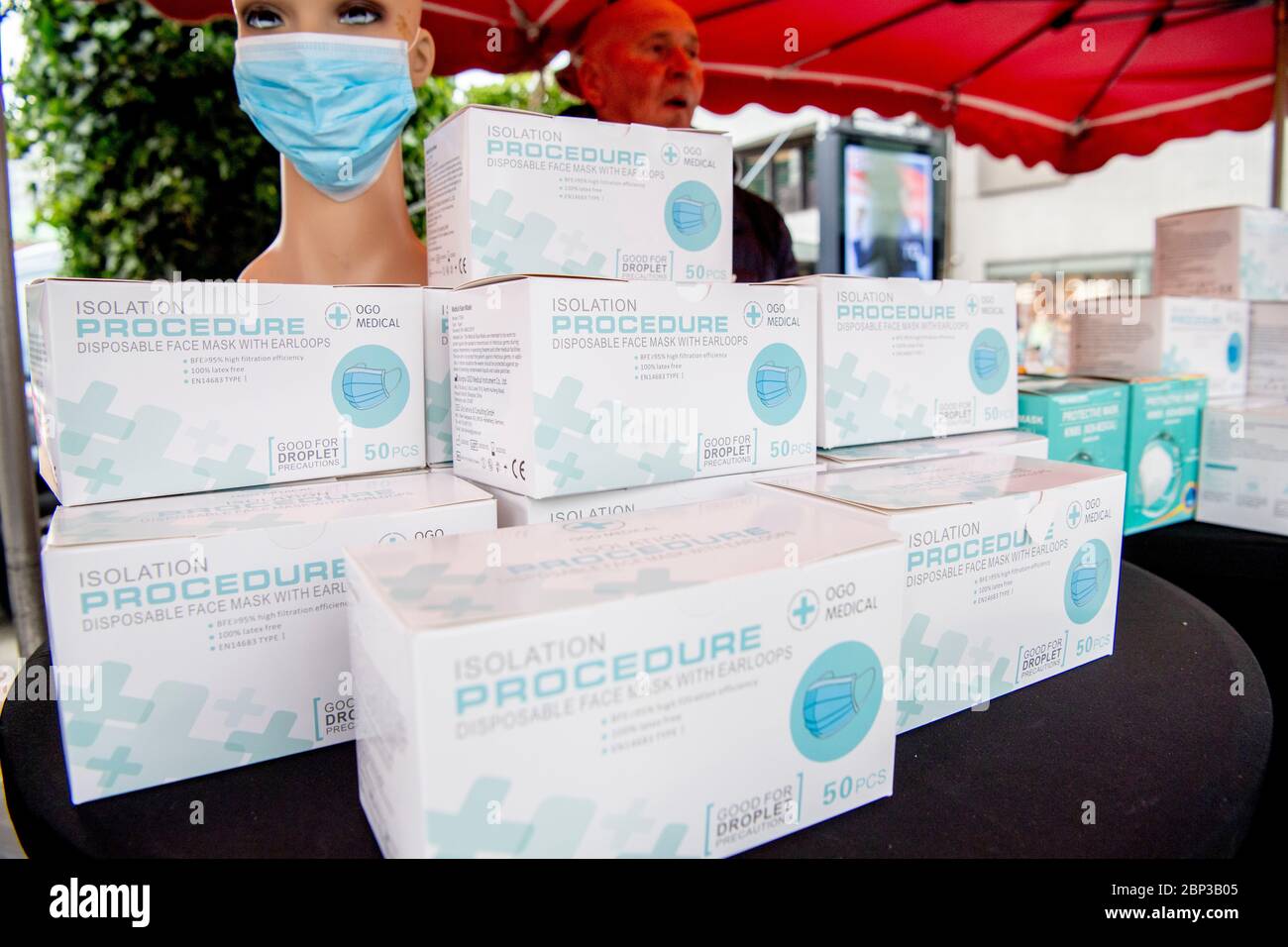 Face mask boxes displayed at a store.Various shops are selling face