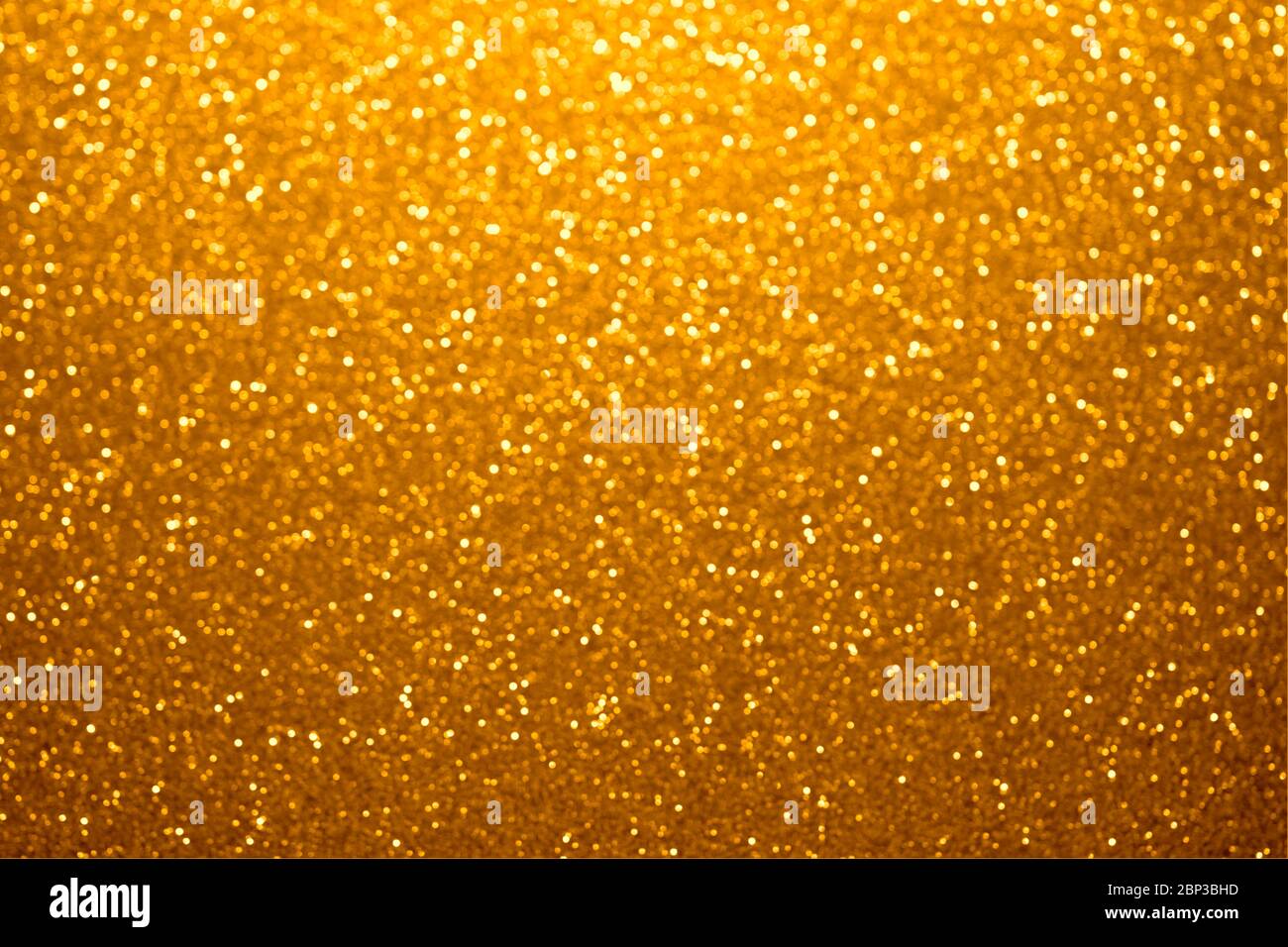 Festive Decorative Abstract Golden Background With Sparkling Shimmering Glitter Beautiful Bokeh Background For Your Design Stock Photo Alamy
