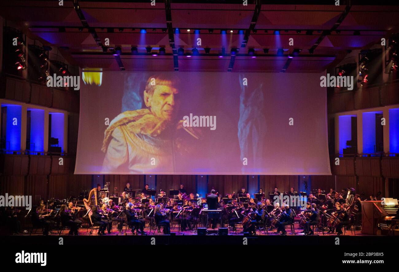 NASA Celebrates 60th Anniversary with National Symphony Orchestra  Star Trek composer Michael Giacchino conducts the National Symphony Orchestra during the &quot;Space, the Next Frontier&quot; event celebrating NASA's 60th Anniversary, Friday, June 1, 2018 at the John F. Kennedy Center for the Performing Arts in Washington. The event featured music inspired by space including artists Will.i.am, Grace Potter, Coheed &amp; Cambria, John Cho, and guest Nick Sagan, son of Carl Sagan. Stock Photo
