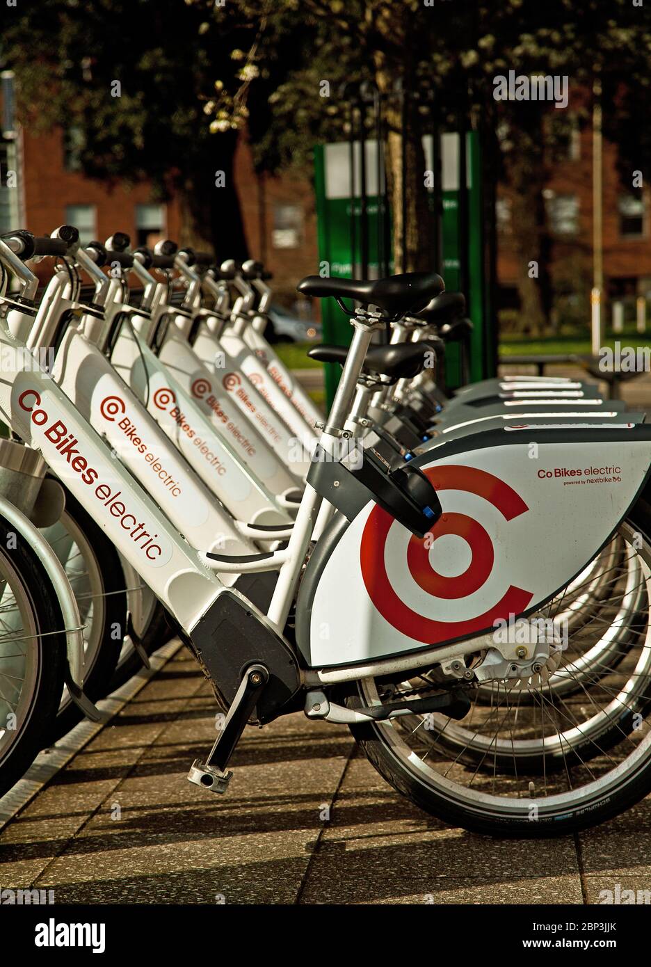 Co Bikes Electric Bicycles ready for hire Stock Photo
