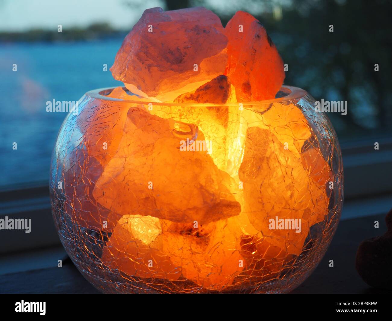 Glowing Salt Rock and Rose Quartz Rocks Lamp Stock Photo
