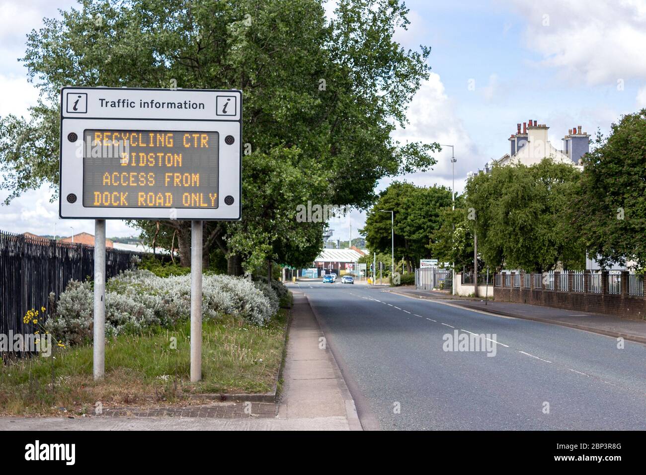 Recycling Centre access information sign. Controlled access due to Covid-19 lockdown restrictions. Sign on Dock Road, Birkenhead Stock Photo