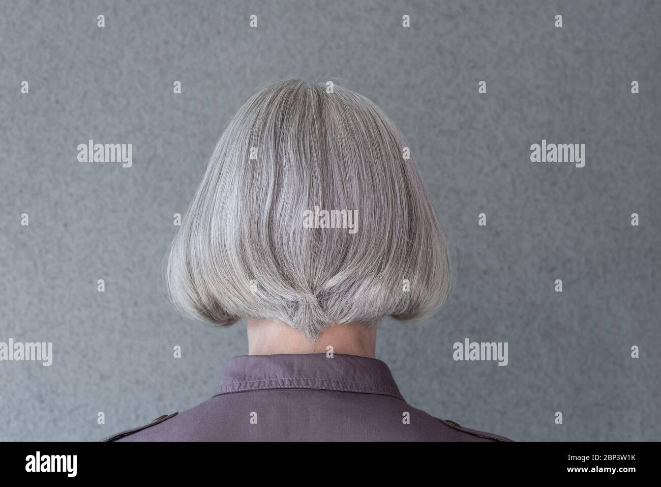Mature woman styling hair hi-res stock photography and images - Alamy