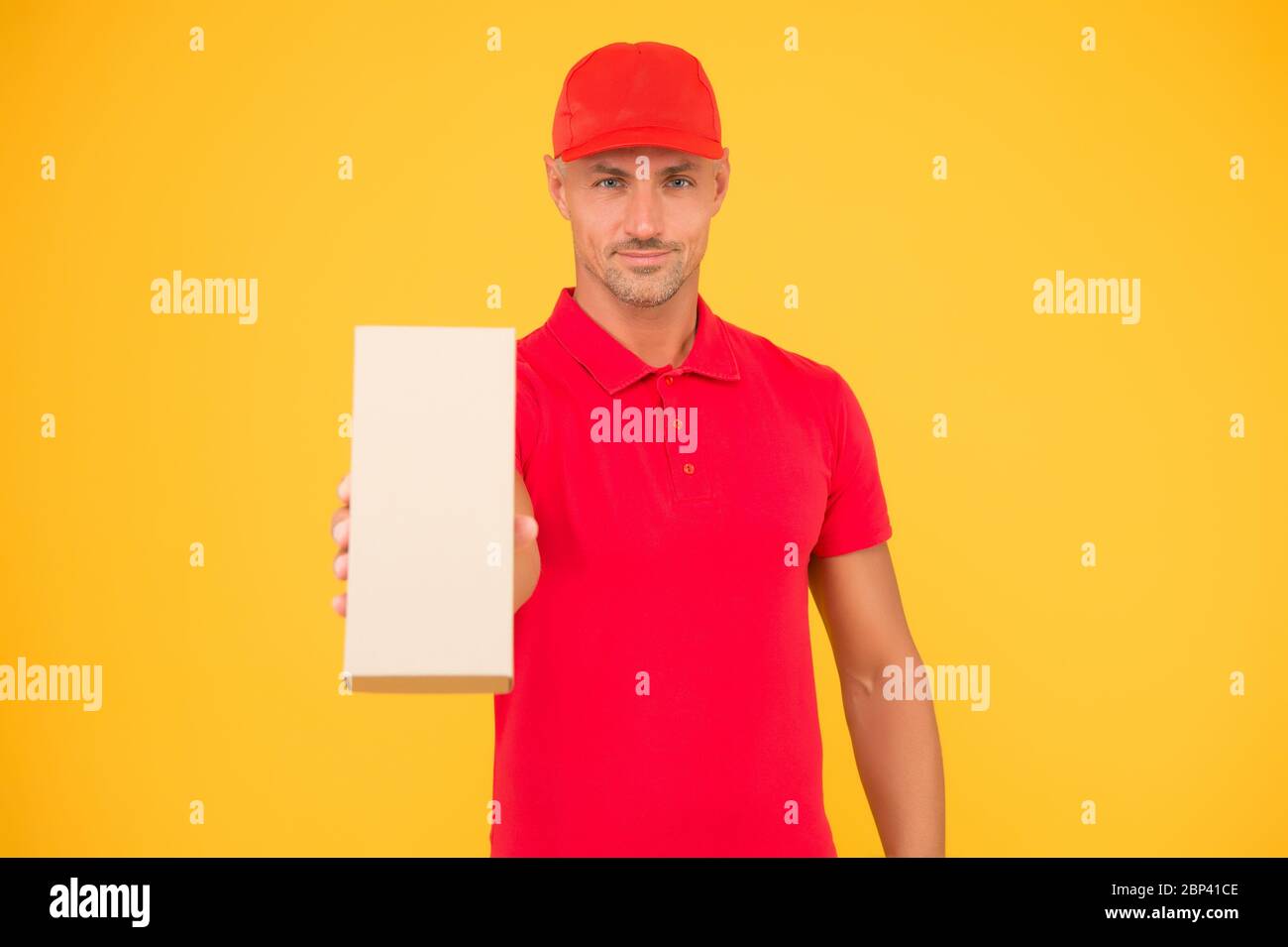 Your package in our safe hands. Package boy in red uniform yellow