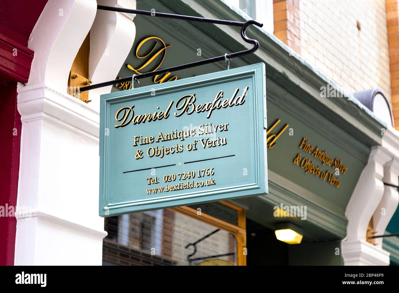 Sign for Daniel Bexfield fine antique ship on famous Victorian antiques and books shopping destination Cecil Court, London, UK Stock Photo