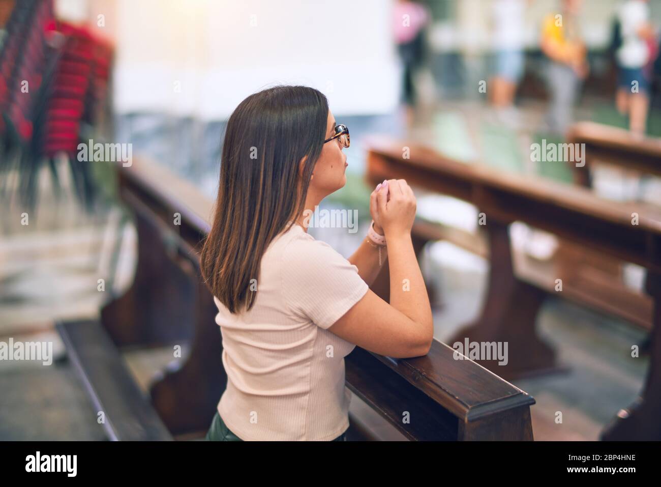 Woman praying on knees catholic hi-res stock photography and images - Alamy