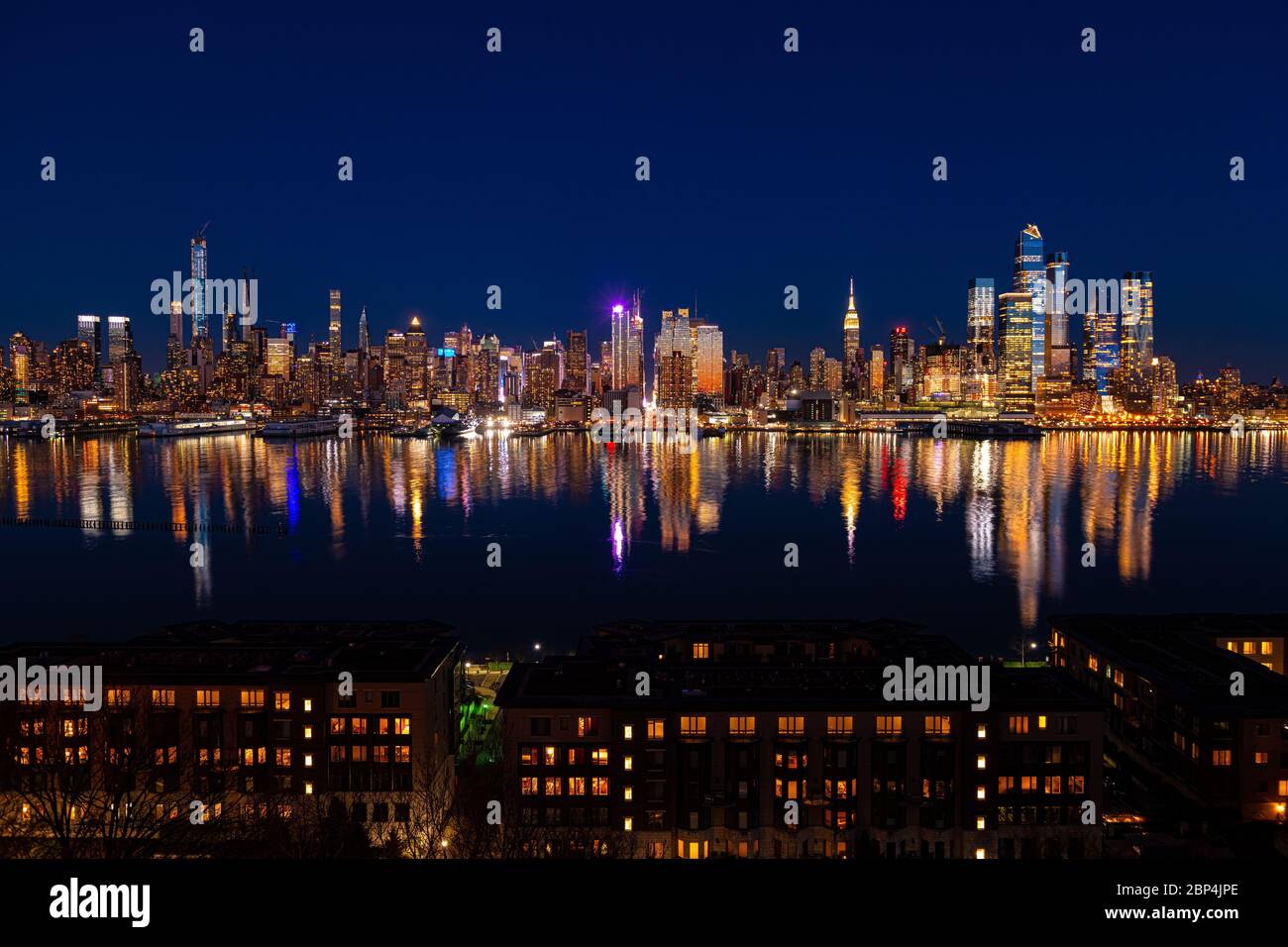 New York City midtown skyline at night with architecture Stock Photo ...