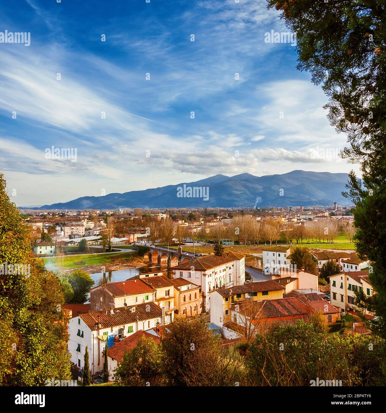 View of Lucca with its famous medieval towers and River Serchio from Monte San Quirico panoramic terrace Stock Photo