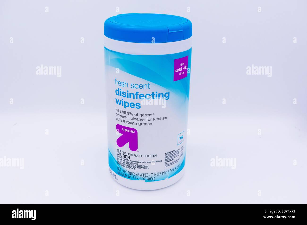 Disinfecting wipes in a plastic container with a big, colorful arrow on a white background that says up and up. Target Corporation brand line - San Jo Stock Photo