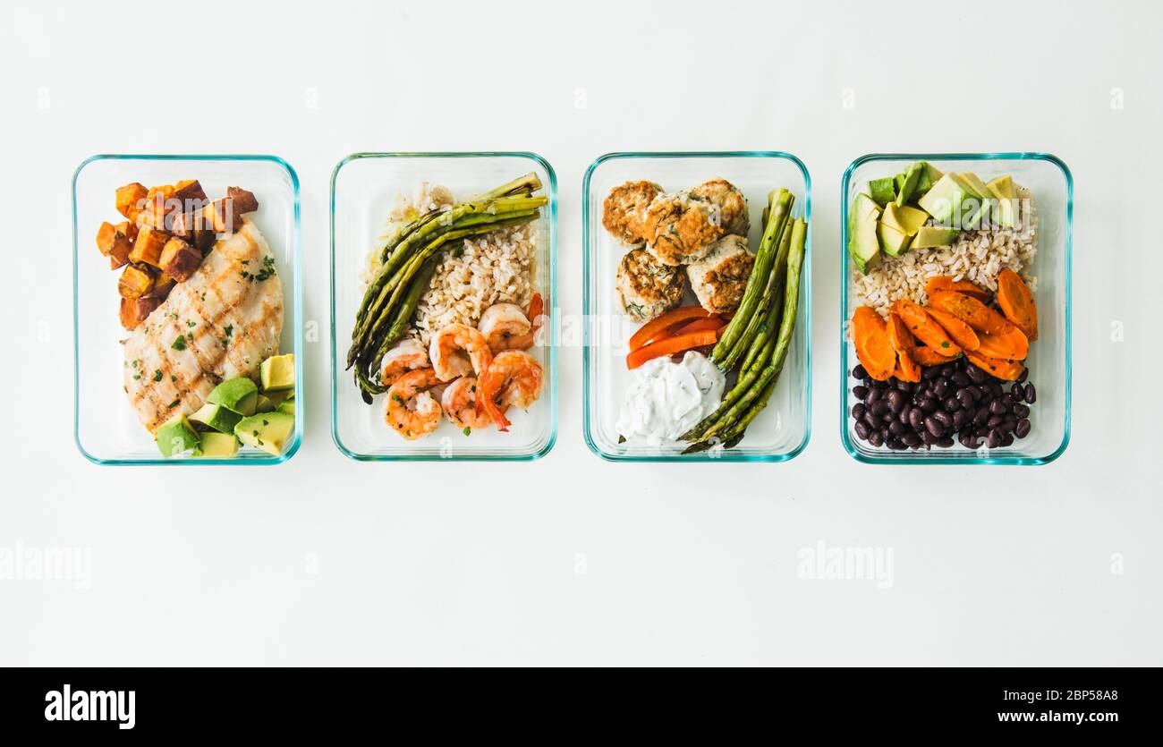 Meal prep containers filled with healthy lunches Stock Photo