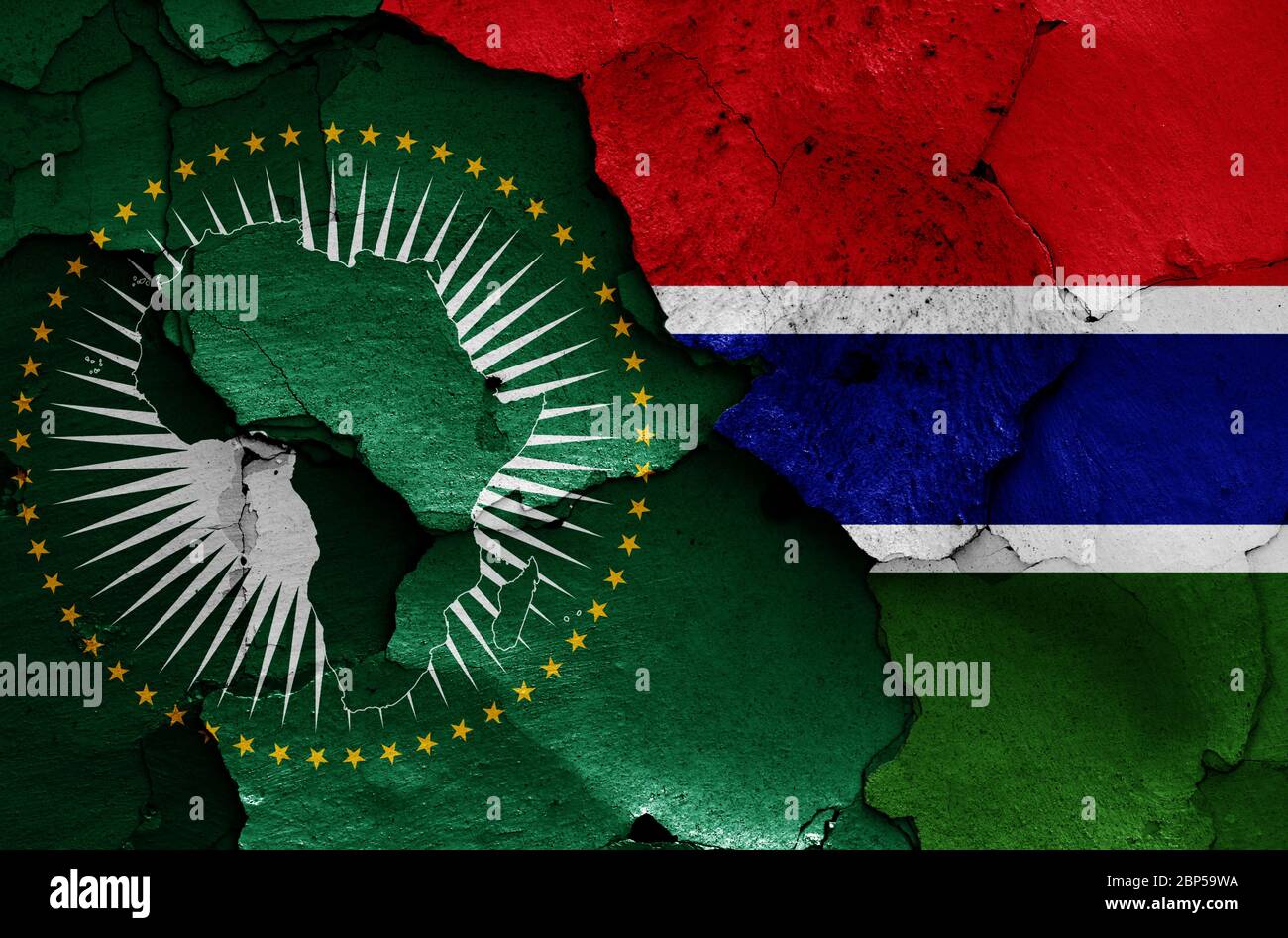 flags of African Union and Gambia painted on cracked wall Stock Photo