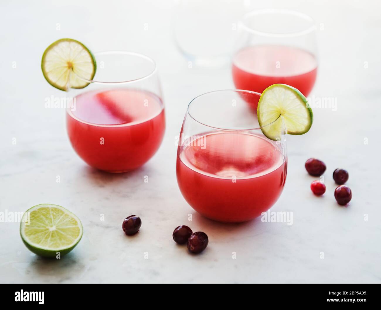 Cosmopolitan with cranberry and lime Stock Photo
