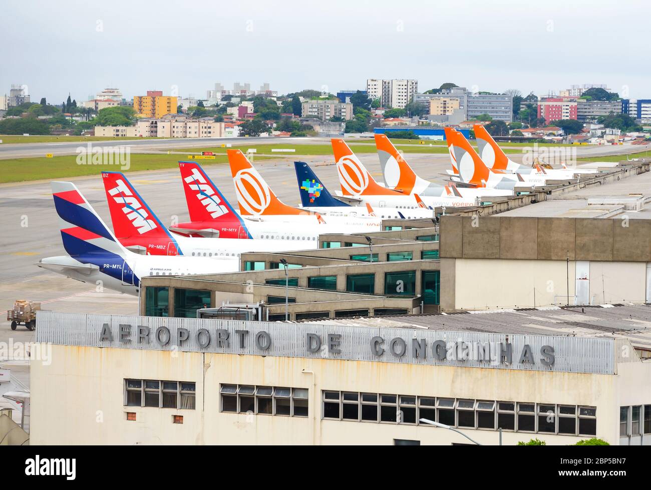 Congonhas Airport (CGH) in Sao Paulo, Brazil with multiple Brazilian airlines aircraft tails lined up. Busy airport terminal with domestic air travel. Stock Photo