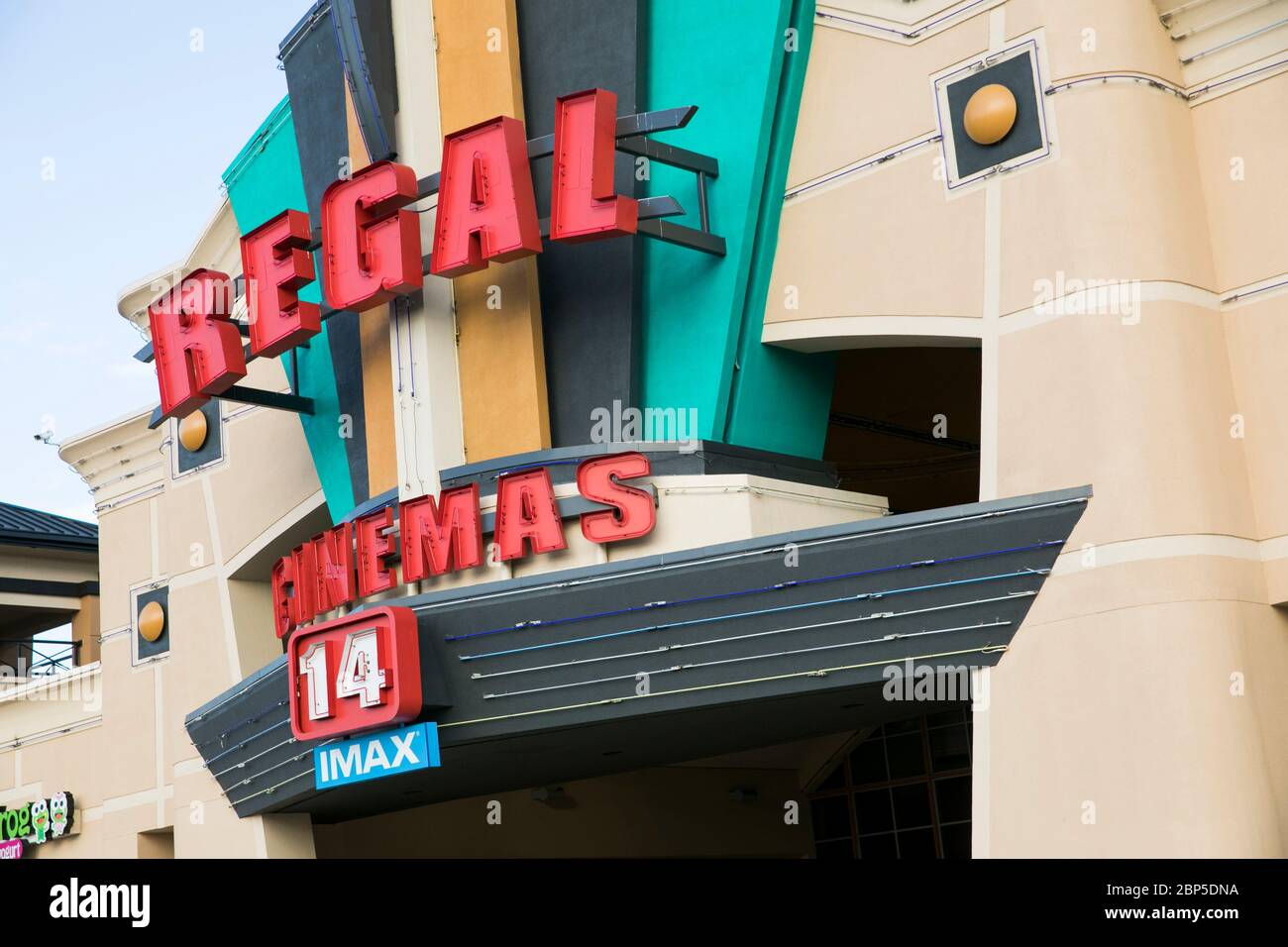 A logo sign outside of a Regal Cinemas movie theater location in Richmond, Virginia on May 13, 2020. Stock Photo
