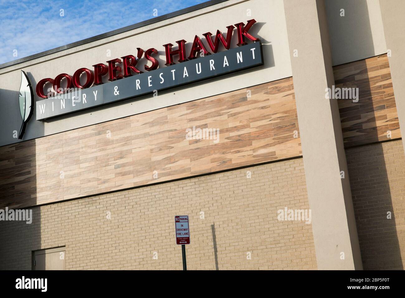 A logo sign outside of a Cooper's Hawk Winery & Restaurant location in Richmond, Virginia on May 13, 2020. Stock Photo