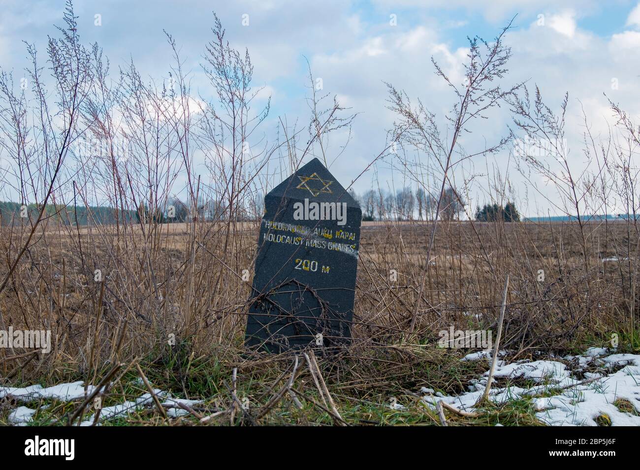 A marker shows the area where all Jewish men were taken for execution. In Eišiškės, Lithuania. The town is the source for the photograph installation Stock Photo