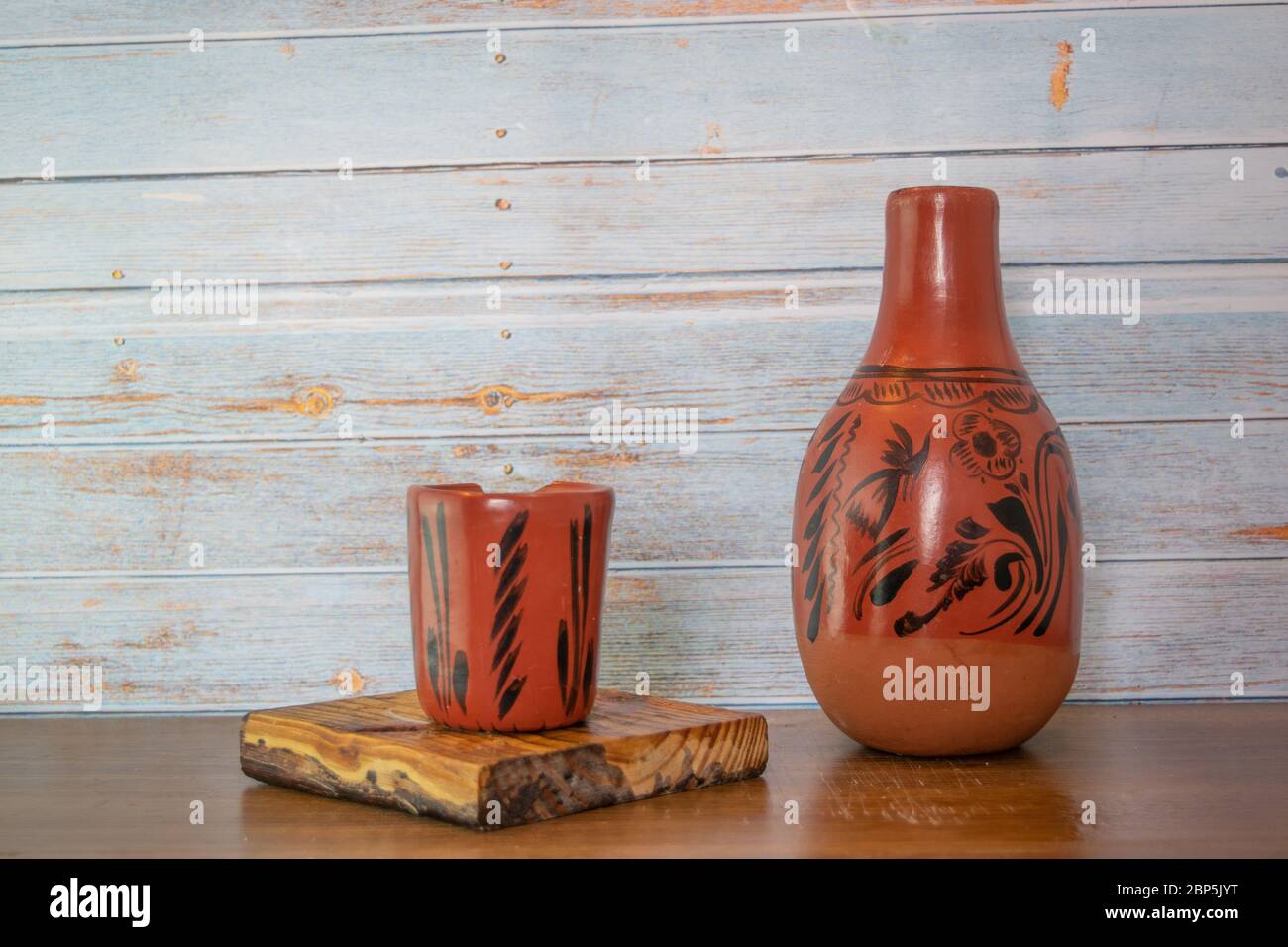 handmade glass and jug from Mexico made of clay Stock Photo - Alamy