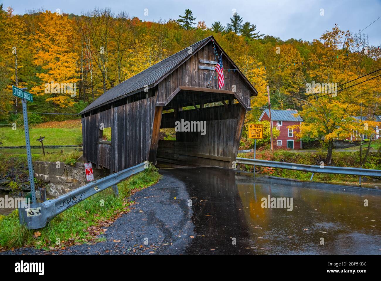 Warren Covered Bridge & Fall Foliage in Rain, Vermont Stock Photo