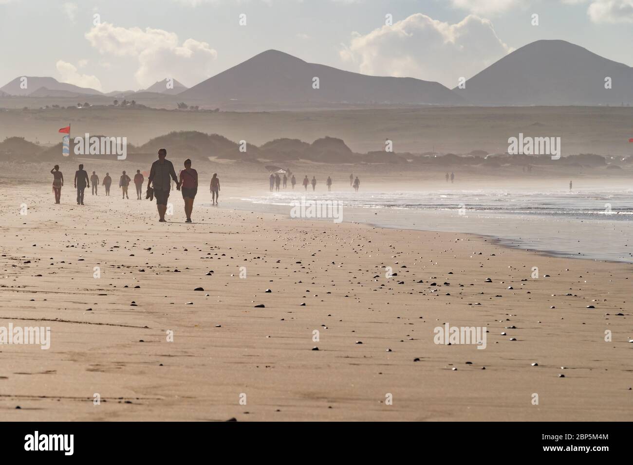 LANZAROTE, SPAIN - NOVEMBER 28, 2016: Kitesurfing in Caleta de Famara, in Lanzarote, Canary Islands, in Spain Stock Photo