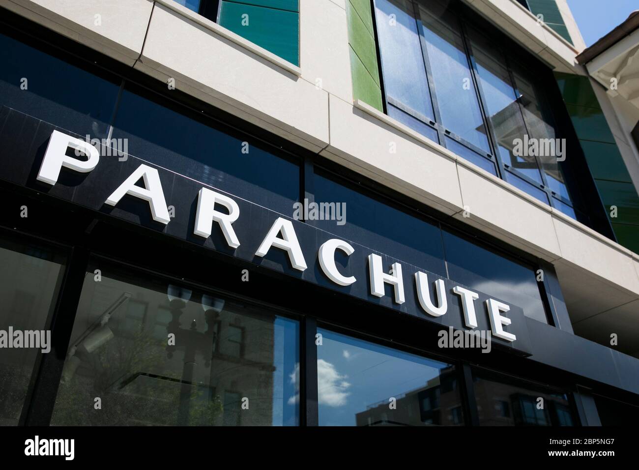 A logo sign outside of a Parachute Home retail store location in Washington, D.C., on May 12, 2020. Stock Photo