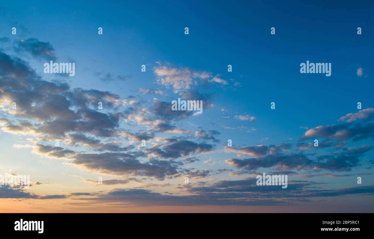 Sunset sky with multicolor clouds Stock Photo - Alamy