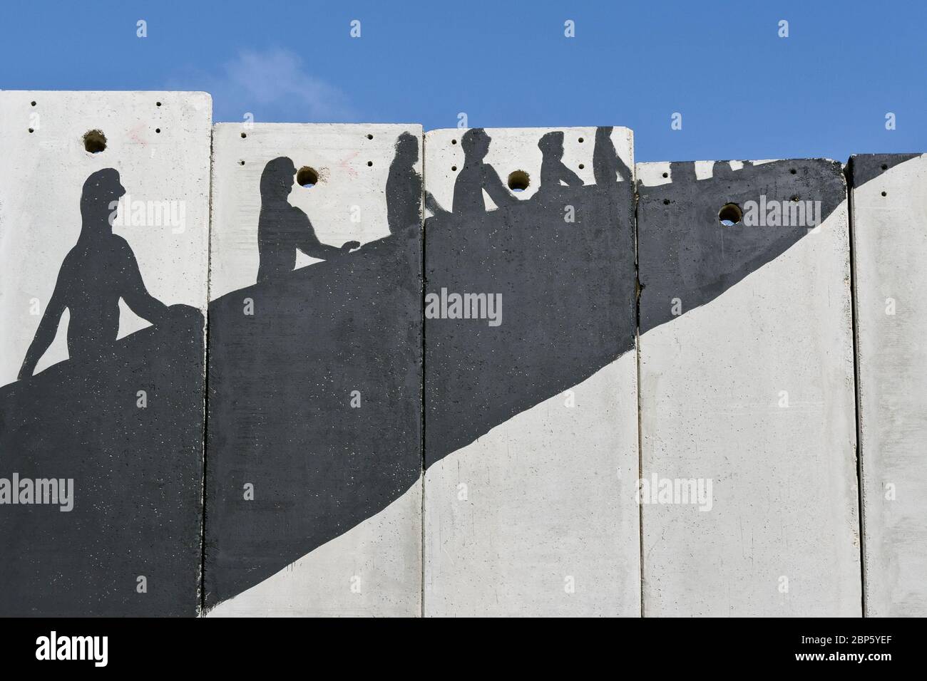 A Banksy graffiti on the separation wall, Palestine Stock Photo