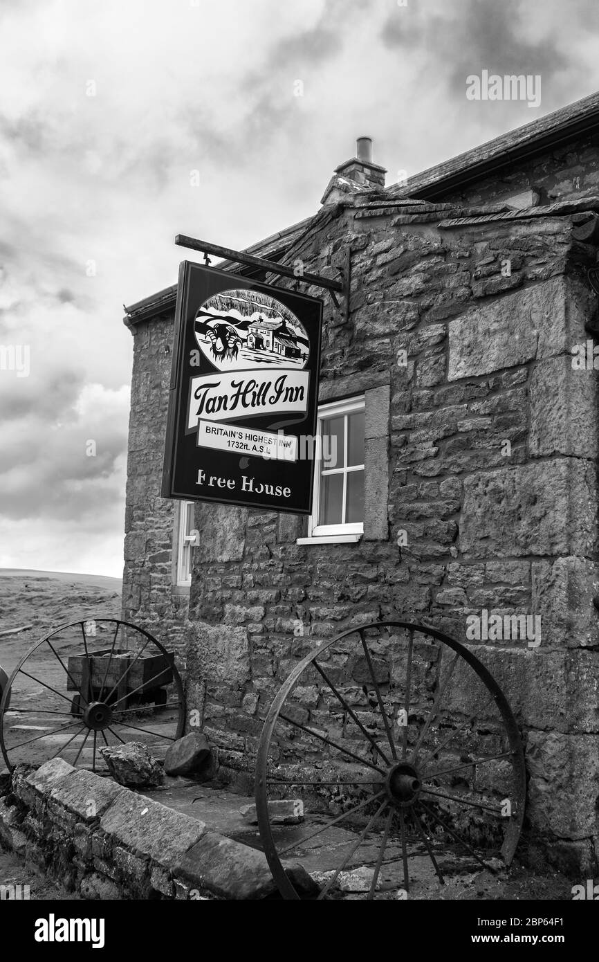The remote fell-top Tan Hill Inn, North Yorkshire, England, UK: the highest pub in Britain.  Black and white version Stock Photo