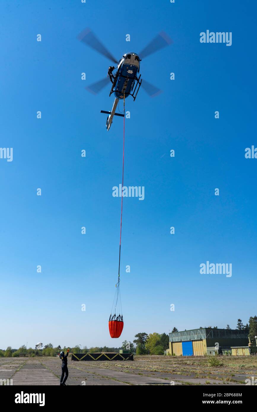 Forest fire in the German-Dutch border region near Niederkrüchten-Elmpt, in a nature reserve, deployment of fire-fighting helicopters, Airbus H145 , o Stock Photo