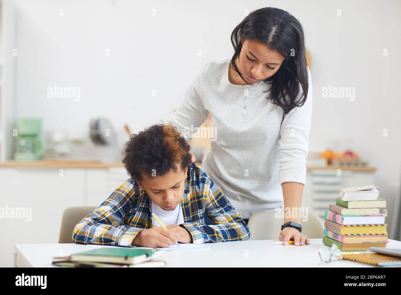 Teenage boy and young mother hi-res stock photography and images - Alamy