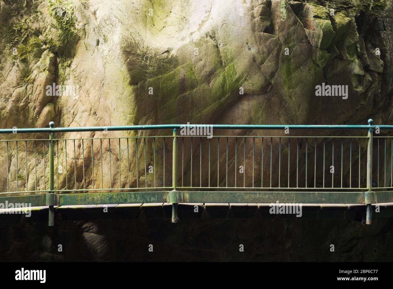 walkway railing along a river gorge, Orrido di Bellano, Italy Stock Photo